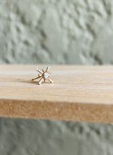 Load image into Gallery viewer, Single 14k Gold Fill Star Crossed Lover Stud Earrings on a simple wooden board. 
