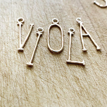 Load image into Gallery viewer, Hammered Gold Fill Lovely Letter initial charms spelling out the name Viola. 
