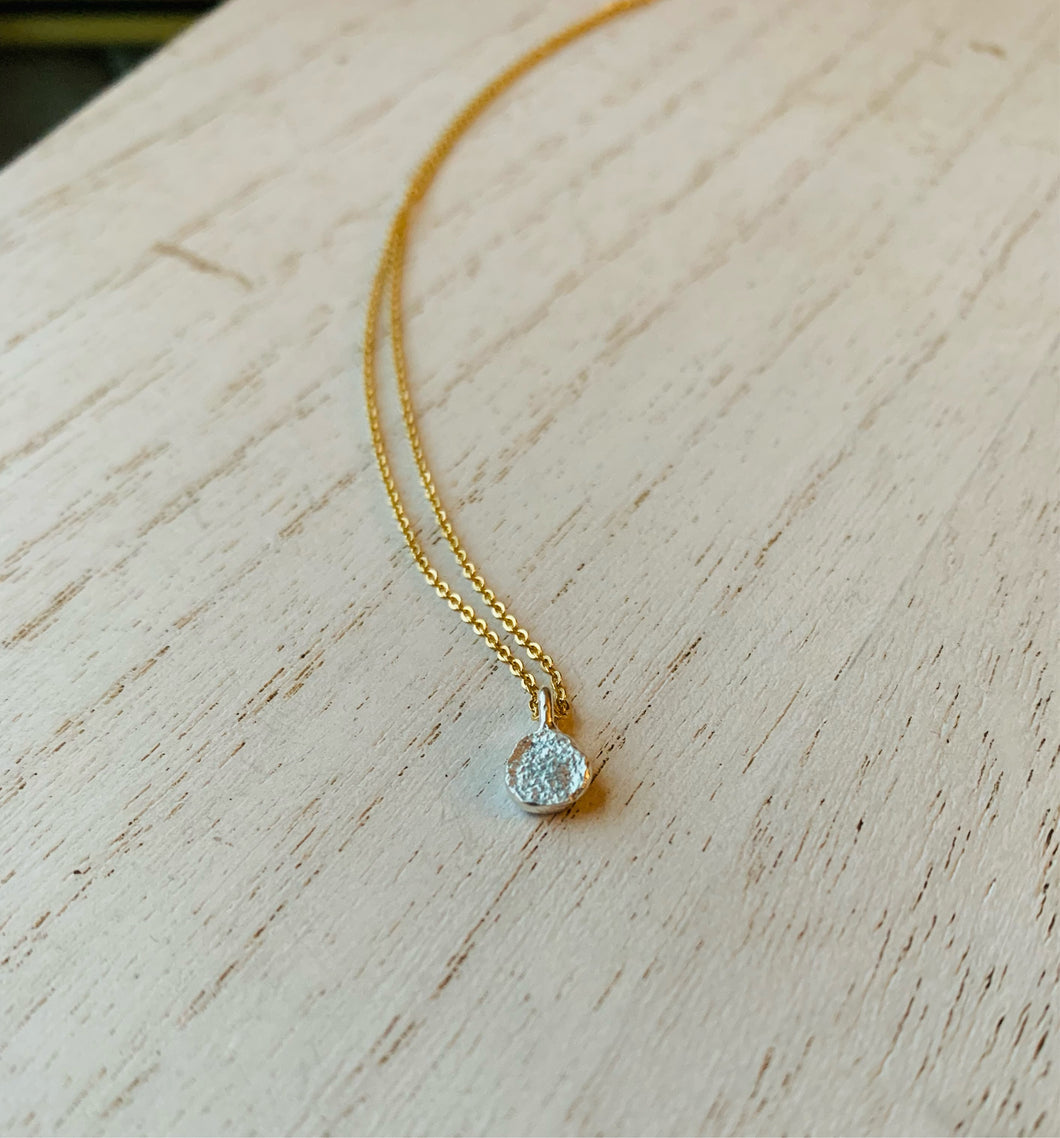 rustic fine silver moonbeam necklace hangs from dainty 14k gold fill chain