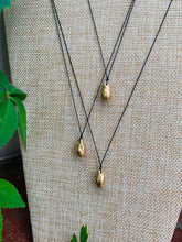 Load image into Gallery viewer, wanderlust necklaces in the garden
